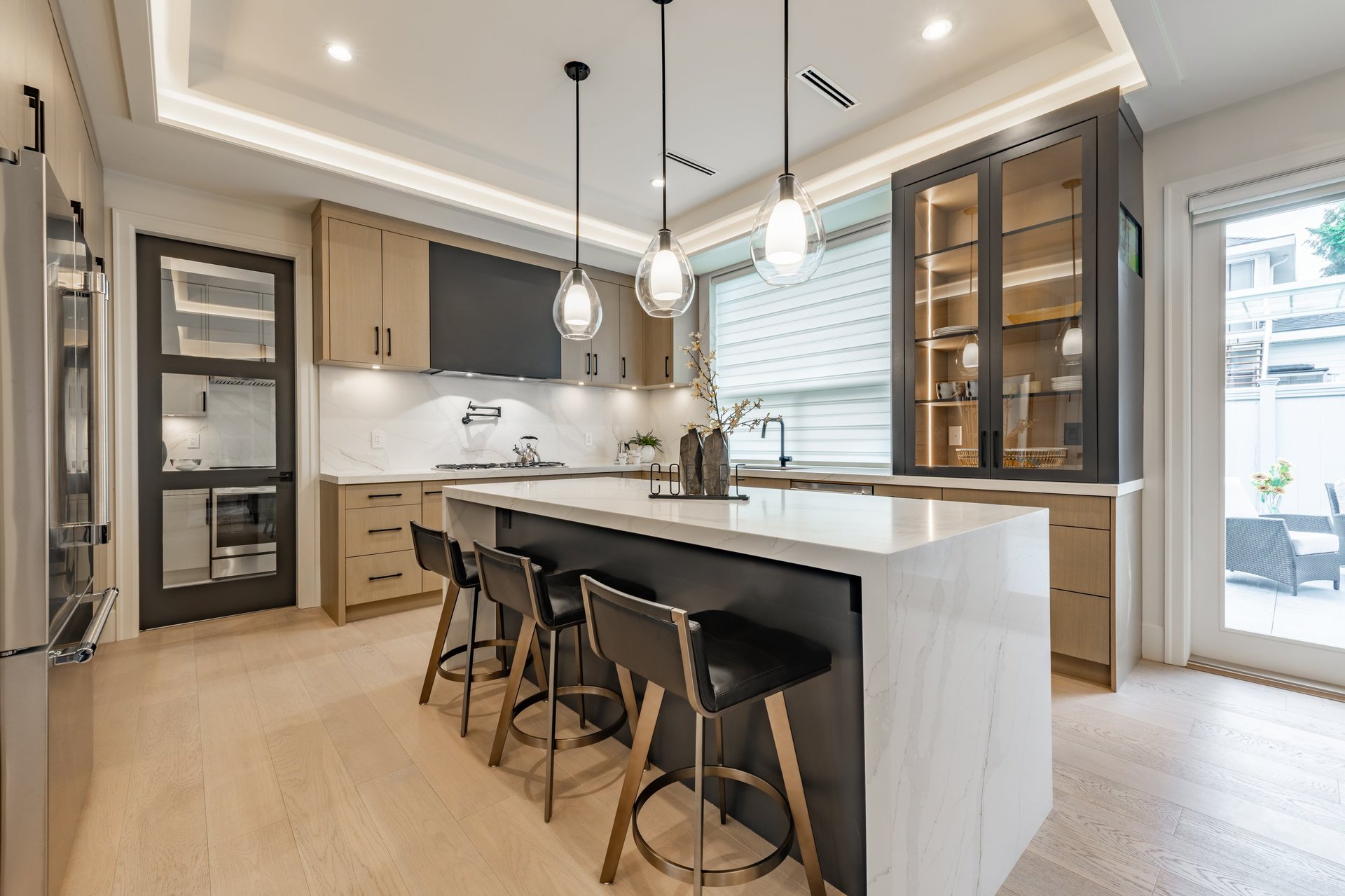 Beautiful kitchen remodel with white countertops and modern finishes